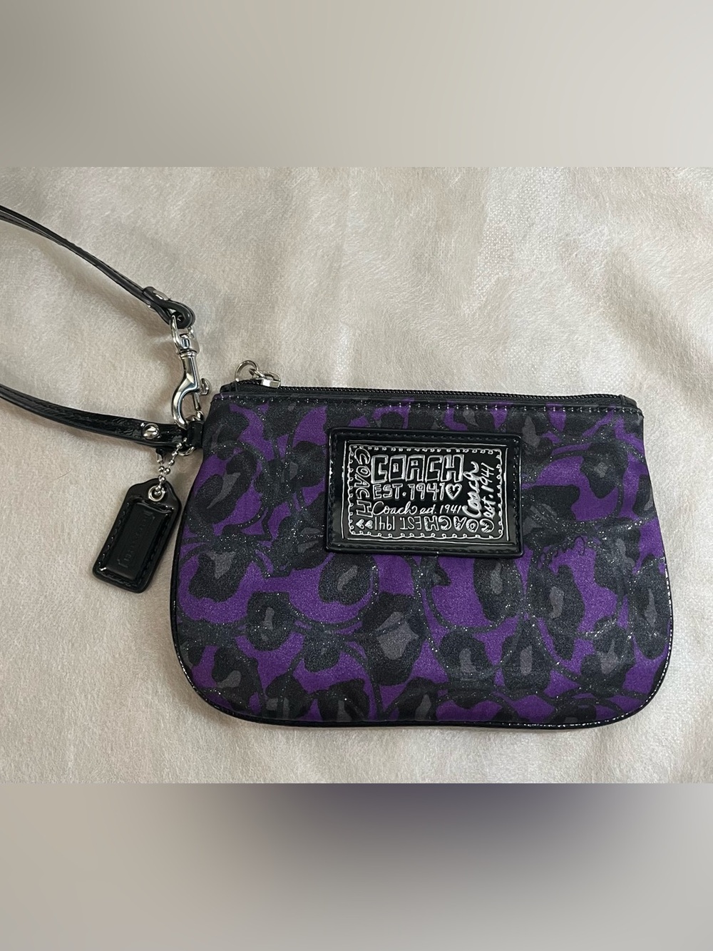 Coach Poppy Daisy Purple and Black Ocelot Canvas/Leather Wristlet.